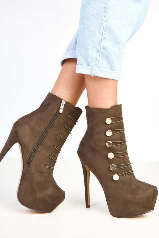 Bottes vertes sur plateforme et talon...