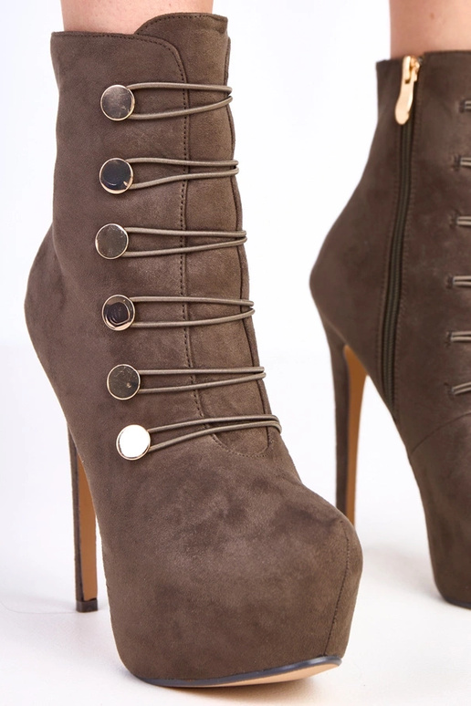 Bottes vertes sur plateforme et talon...