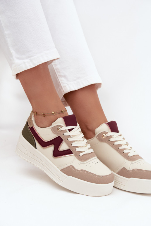 Chaussures modèle baskets Féminin avec une plateforme avec des détails dorés beige Zalvra