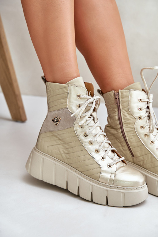 Peau Bottes avec une plateforme Il fautciejka 06751-25 couleur dorée