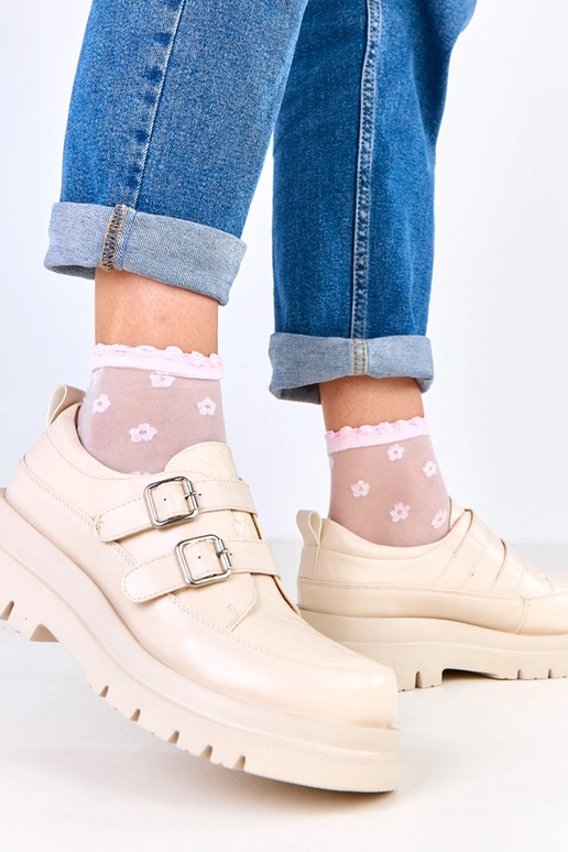 Bottines beiges sur semelle massive,...