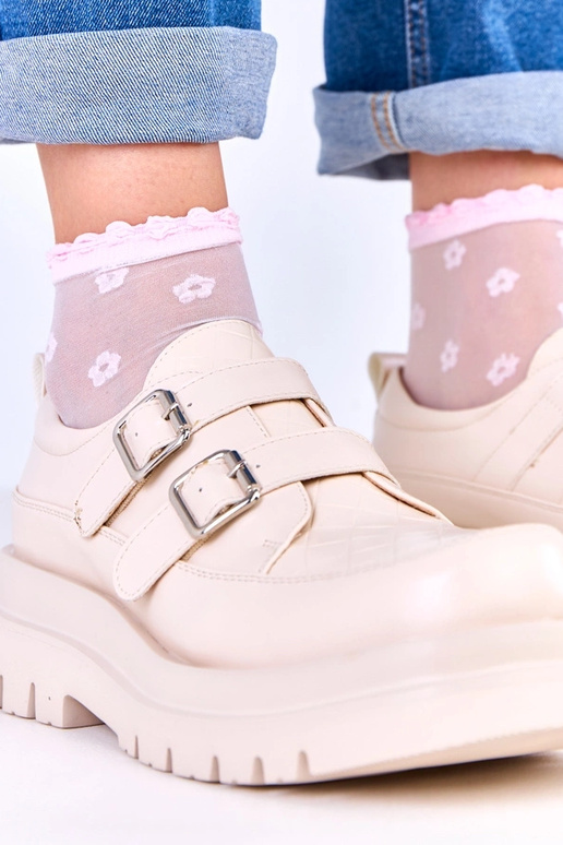 Bottines beiges sur semelle massive,...