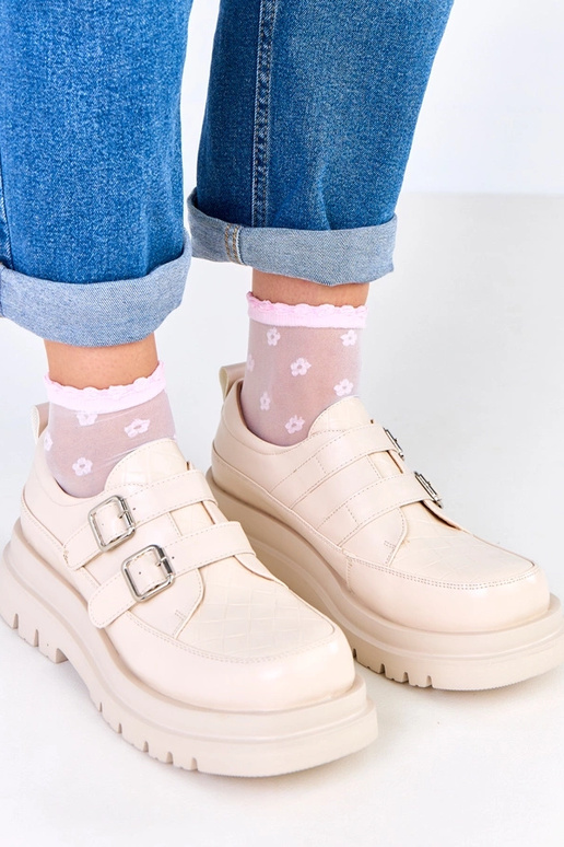 Bottines beiges sur semelle massive,...