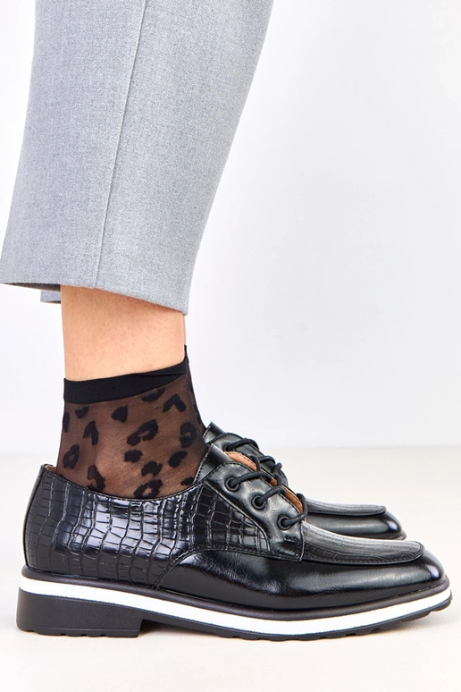 Bottines noires avec embossage et...