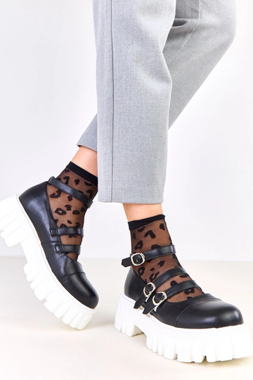 Bottines noires sur semelle...