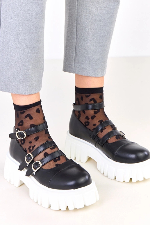 Bottines noires sur semelle de...