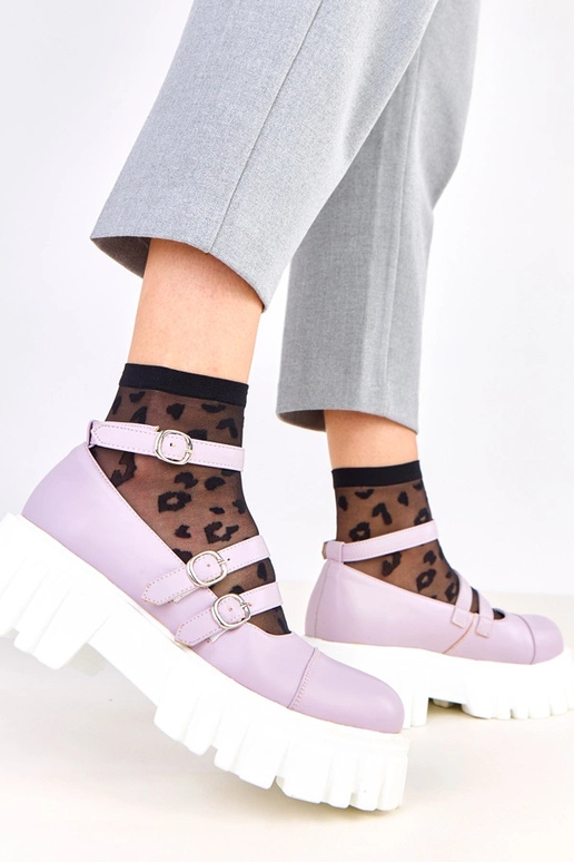 Bottines violettes sur semelle de...