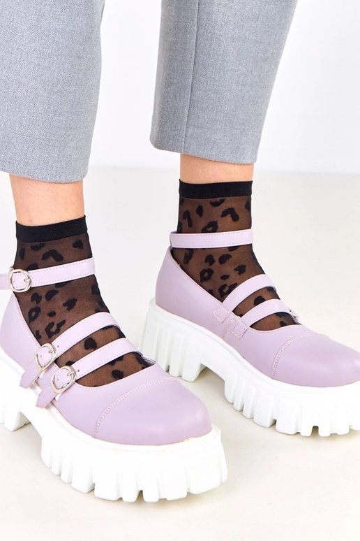 Bottines violettes sur semelle de...