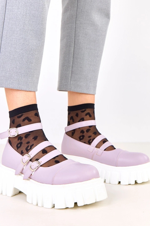 Bottines violettes sur semelle de...