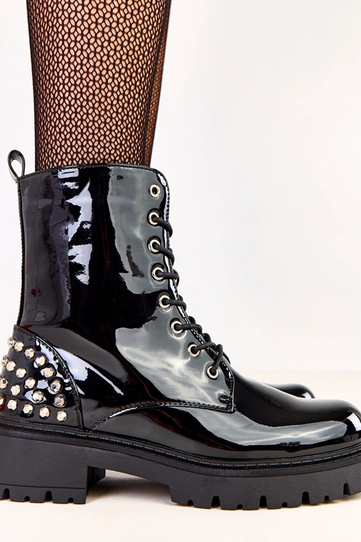 Bottes noires en vernis avec des...