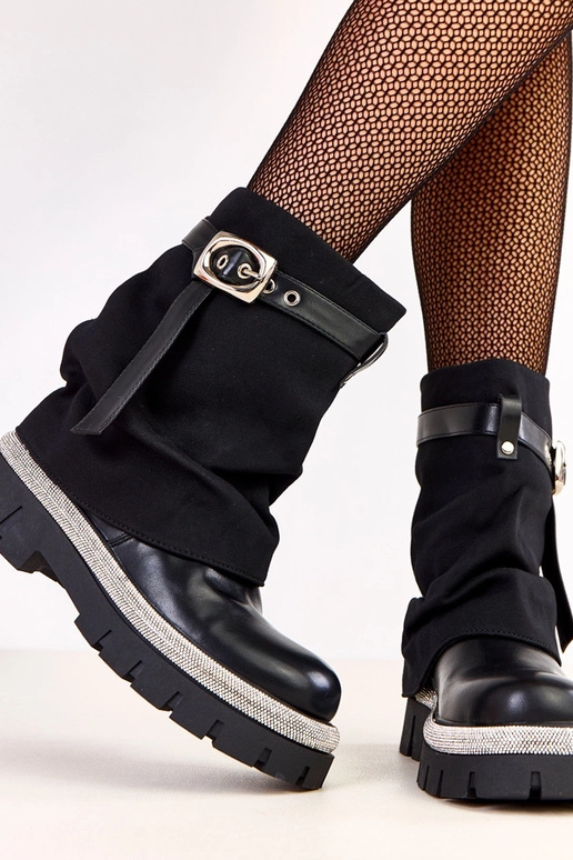 Bottines noires avec tige retournée...