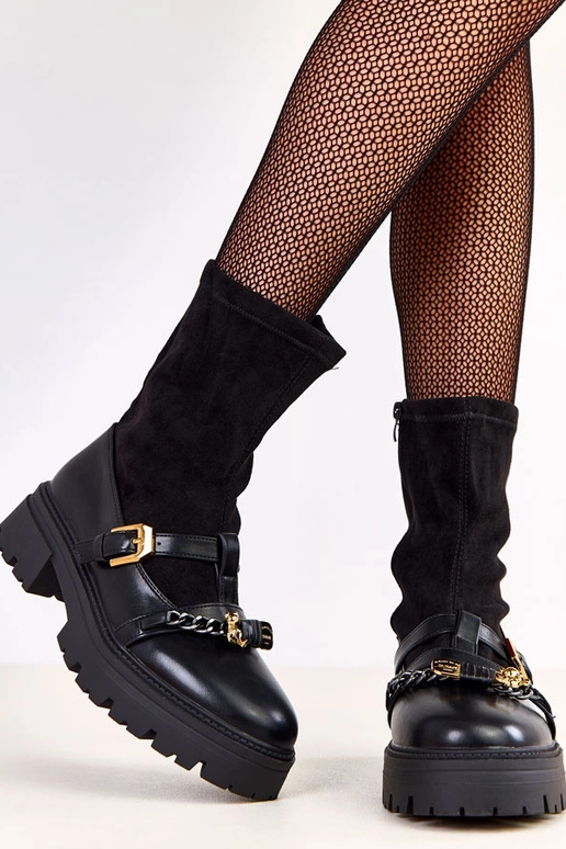 Bottines noires ornées d'un ourson et...