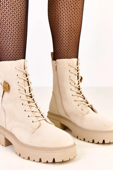 Bottines féminines beige ornées d'un ourson doré Valery