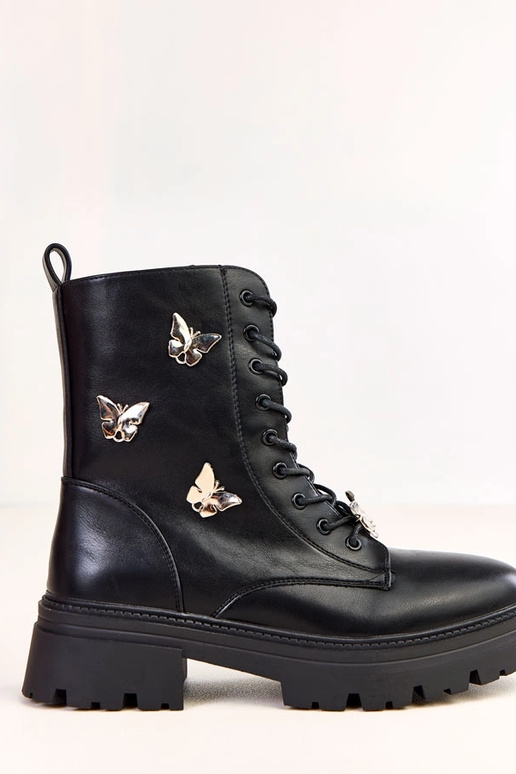 Bottines féminines noires ornées de...