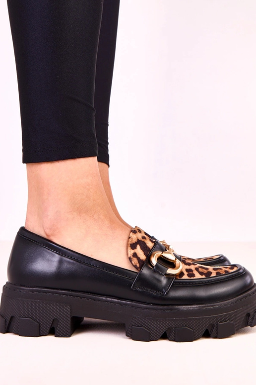 Mocassins noirs avec accent à motif...