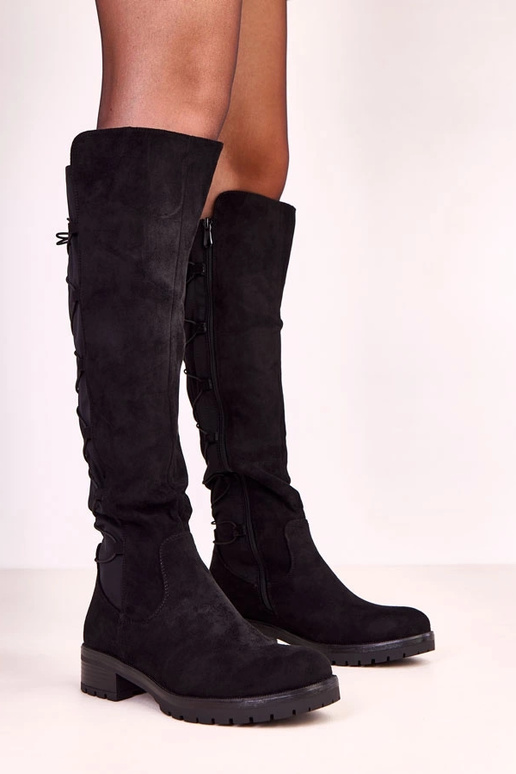 Bottes noires montantes avec lacets... Bottes noires montantes avec lacets...