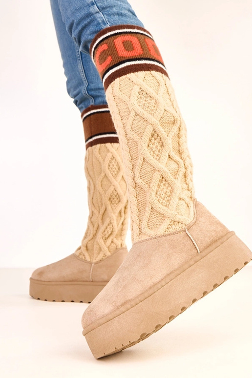 Bottes de neige beiges avec... Bottes de neige beiges avec...