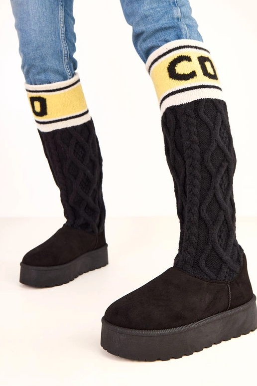 Bottes de neige noires avec... Bottes de neige noires avec...