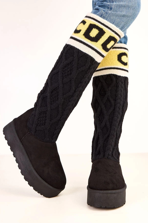 Bottes de neige noires avec... Bottes de neige noires avec...