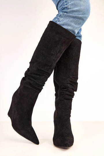 Bottes hautes noires sur... 2