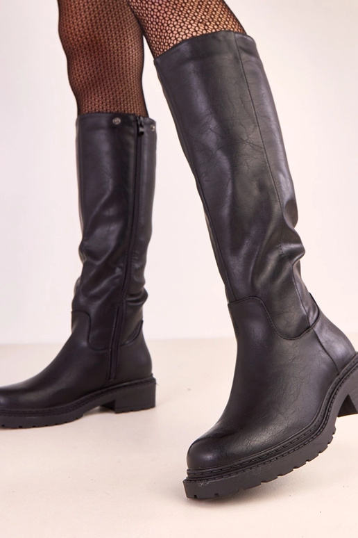 Bottes hautes noires avec tige... Bottes hautes noires avec tige...