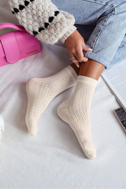 Chaussettes Féminin avec des éléments ajourés couleur ivoire