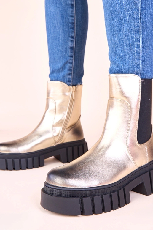 Bottines dorées sur plateforme avec...
