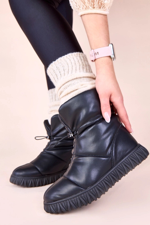 Bottes de neige noires en cuir...