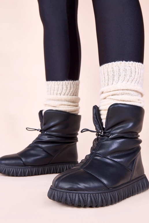 Bottes de neige noires en cuir...