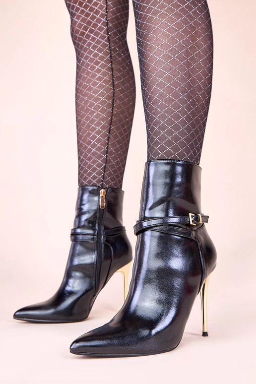 Bottines noires sur talon doré fin...