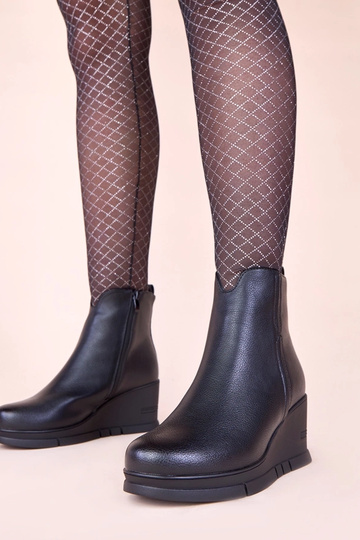 Bottines noires sur...