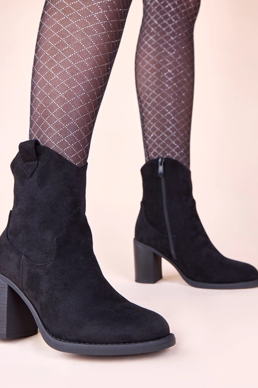 Bottines noires à talon bloc en suède...