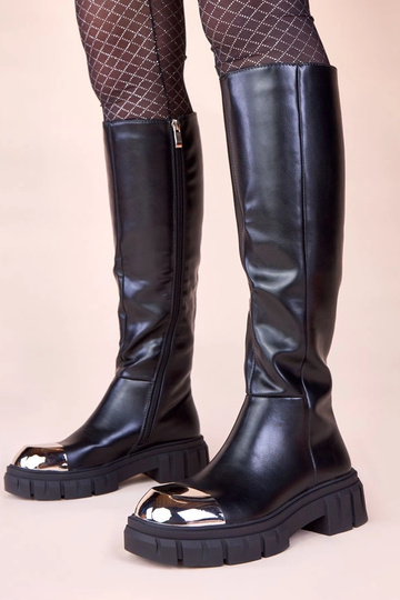 Bottes noires montantes...