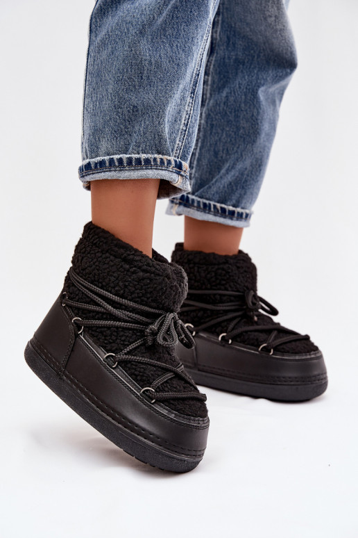 Bottes de neige Féminin avec un manteau de fourrure Typu Baranek avec des sangles couleur noire Belira