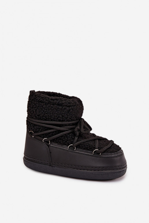 Bottes de neige Féminin avec un manteau de fourrure Typu Baranek avec des sangles couleur noire Belira