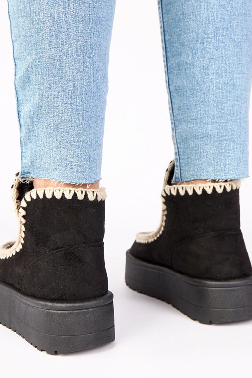 Bottes de neige noires sur plateforme...