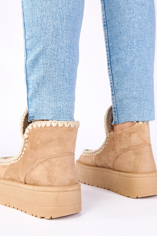 Bottes de neige beiges foncées sur...