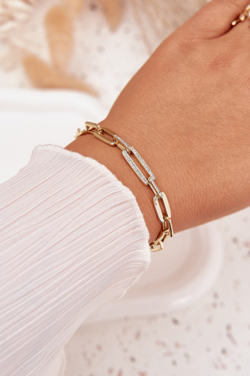 Bracelet femme avec des chaînes en acier chirurgical couleur or