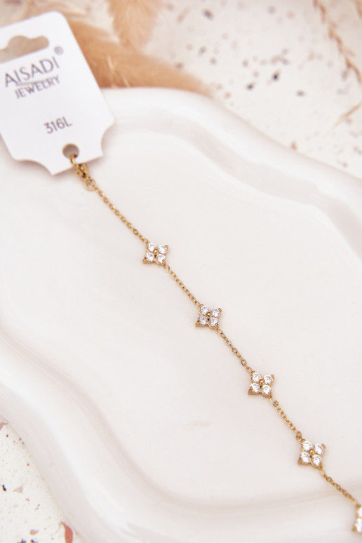 Un braceletavec des motifs florauxuszkami Stal Chirurgiczna couleur dorée