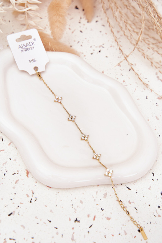 Un braceletavec des motifs florauxuszkami Stal Chirurgiczna couleur dorée