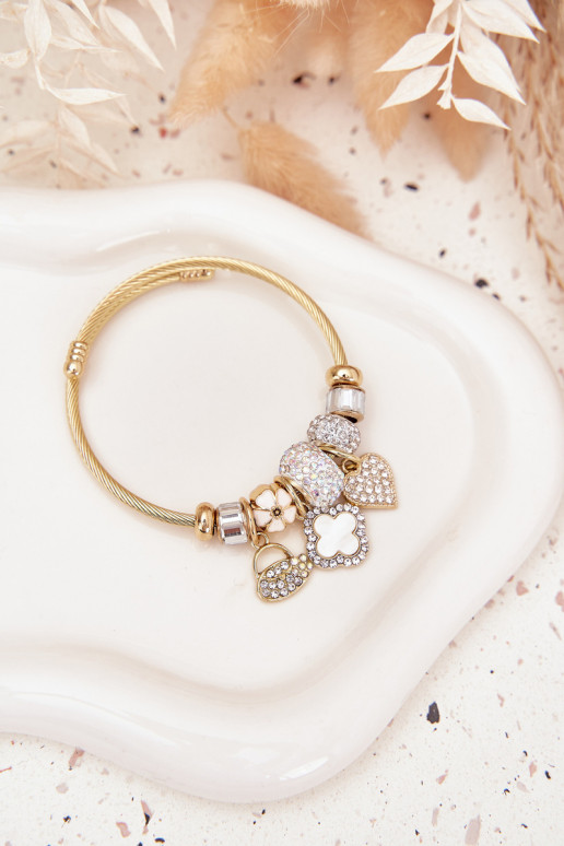 Un bracelet z ZaÀieszkami Charms couleur dorée