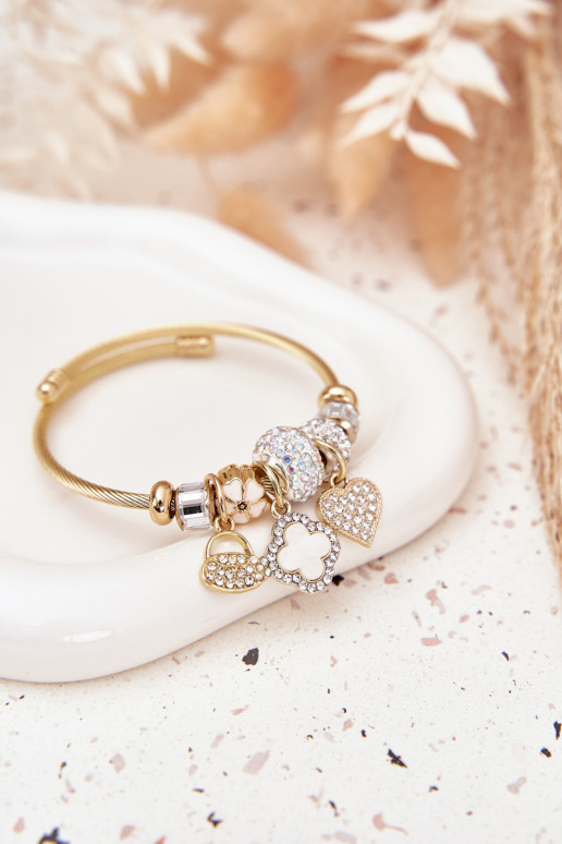 Un bracelet z ZaÀieszkami Charms couleur dorée