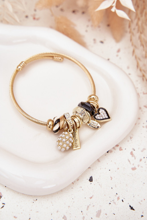 Un bracelet z ZaÀieszkami Charms couleur dorée