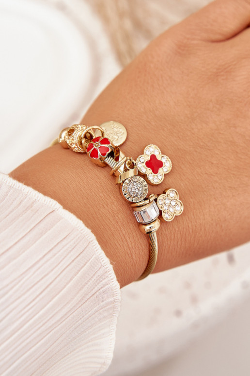 Un bracelet z ZaÀieszkami Charms couleur dorée