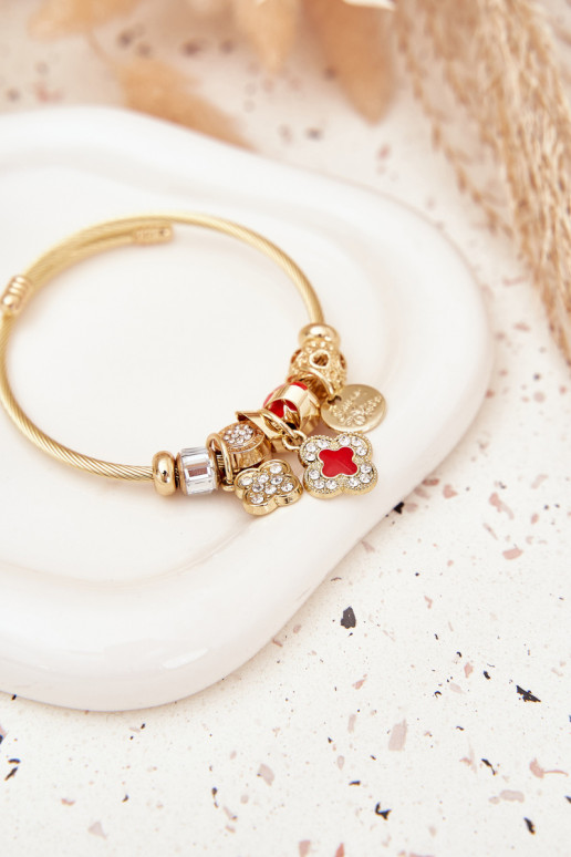Un bracelet z ZaÀieszkami Charms couleur dorée