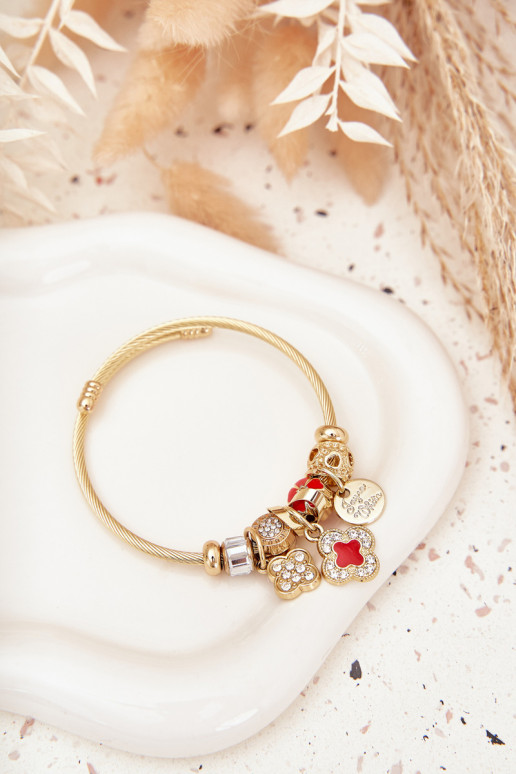 Un bracelet z ZaÀieszkami Charms couleur dorée