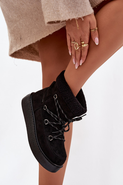 Bottes de neige Féminin avec une plateforme et des détails élégants couleur noire Roselya