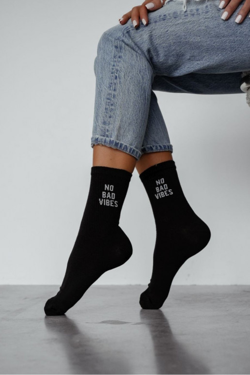 Chaussettes Féminin avec une note NO BAD VIBES couleur noire