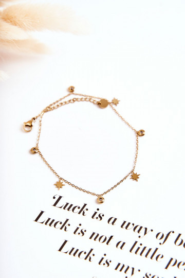 Bracelet de jambe Étoiles je avec œillets en zirconium couleur dorée