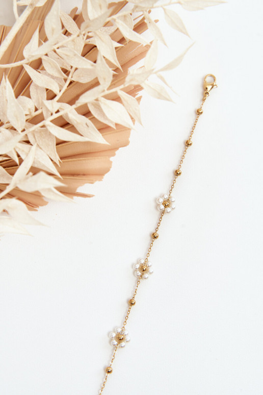 À la mode Un bracelet Avec des fleurs blanches couleur dorée